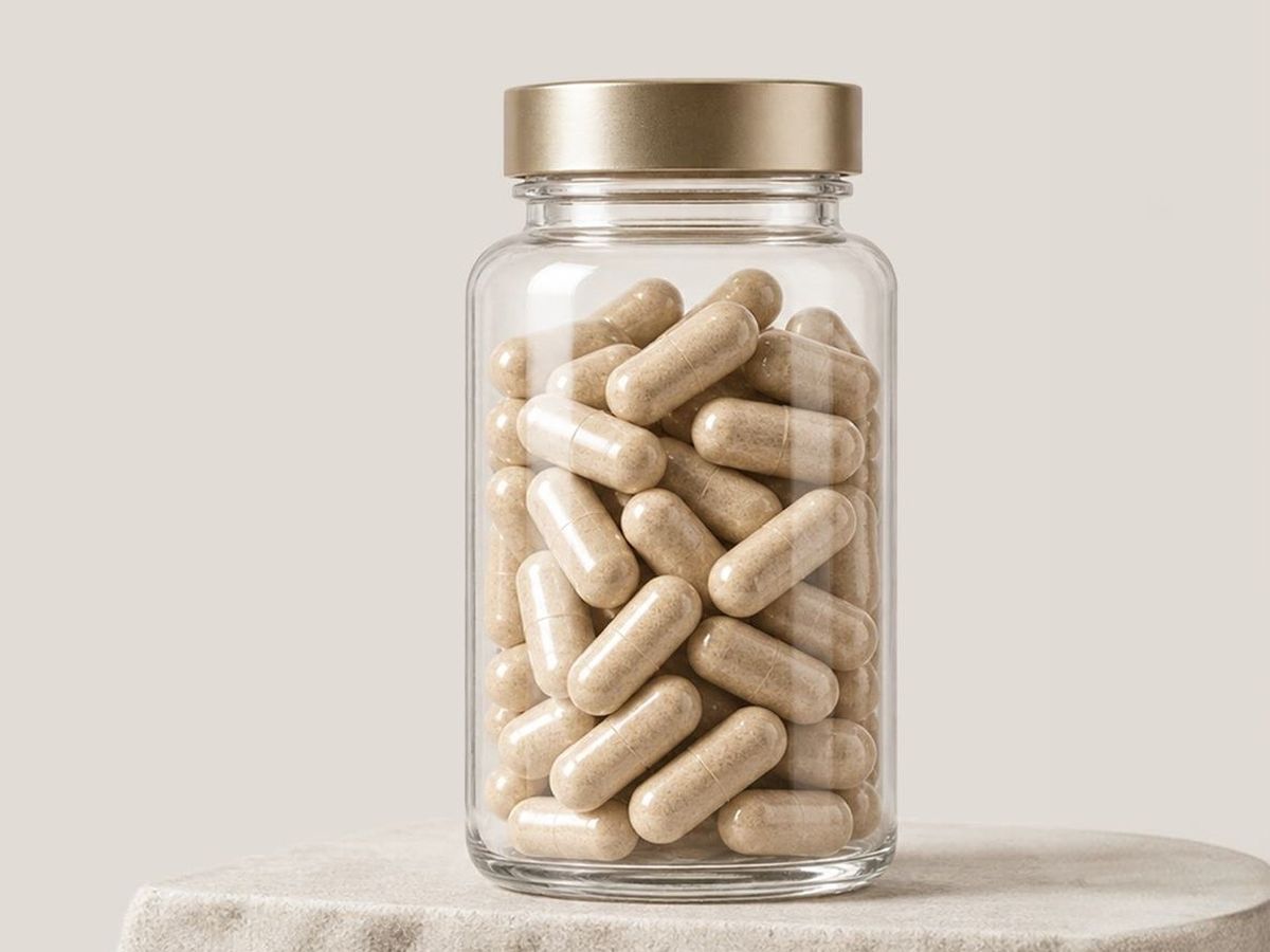 A glass jar of Physta capsules